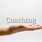 An outstretched hand with a text label which says Coaching